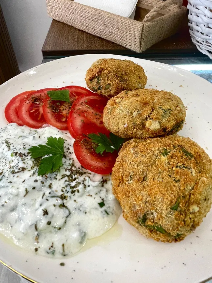 Vegetarian patties with yogurt sauce in Sandanski restaurant